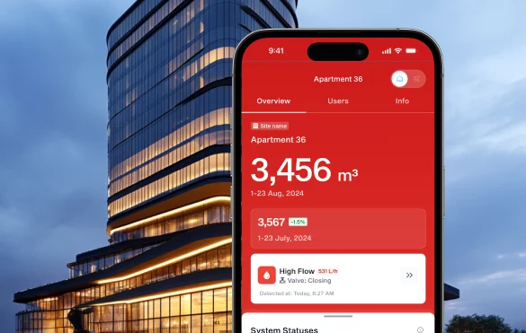 Phone showing overview of Apartment 36 held in front of a large building.